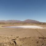 While driving on the road, the sign said volcano (not named). Google maps, however, tells me it is a meteor impact crater.