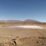 While driving on the road, the sign said volcano (not named). Google maps, however, tells me it is a meteor impact crater.