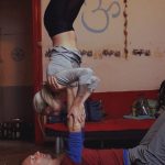 Karla practicing shoulder stands