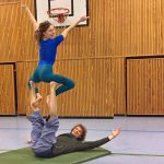 Rikke flying on Rolf.