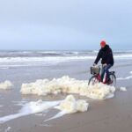 Biking through sea foam at Vesterhavet