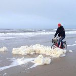 Biking through sea foam at Vesterhavet